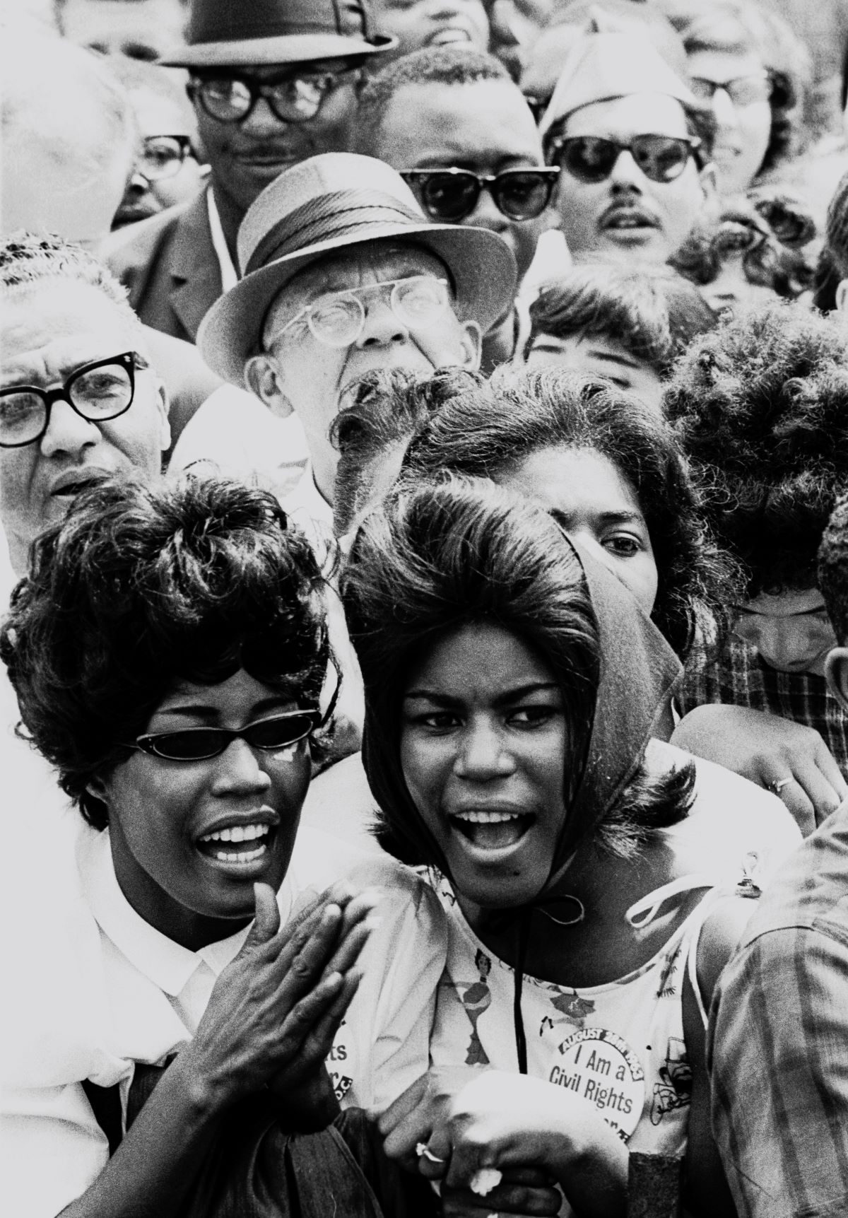 Two women in the crowd at the March on Washington for Jobs and Freedom in Washington, D.C., August 28, 1963.